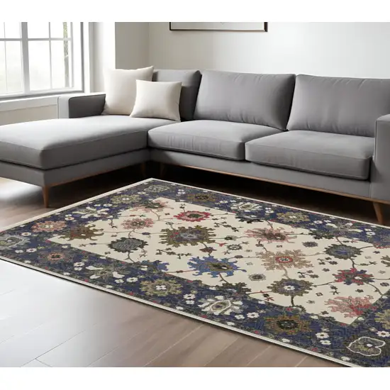 Blue And Ivory Floral Area Rug With Fringe Photo 1