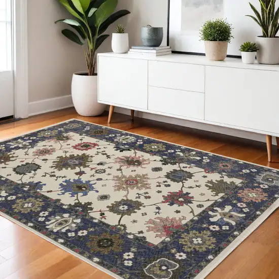 Blue And Ivory Floral Area Rug With Fringe Photo 1