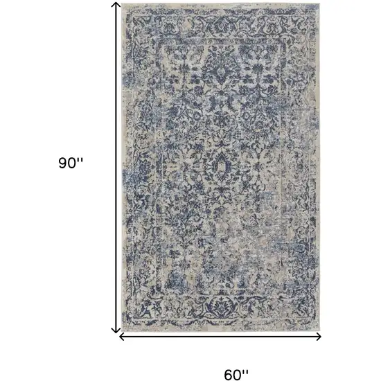 Blue And Ivory Floral Power Loom Distressed Area Rug Photo 4