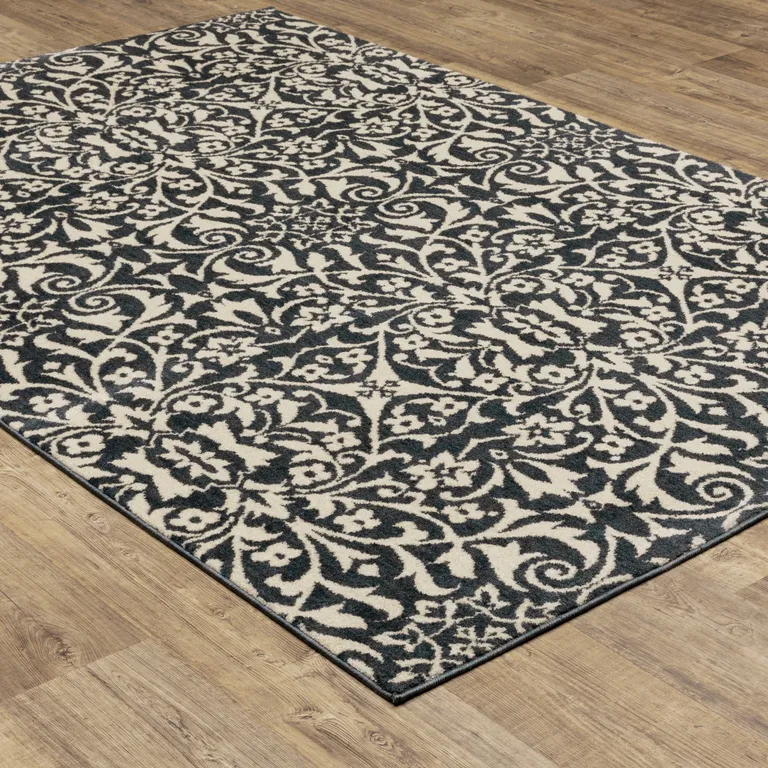 Blue And Ivory Floral Power Loom Stain Resistant Area Rug Photo 4