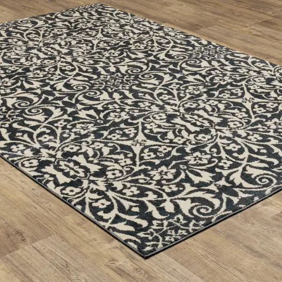 Blue And Ivory Floral Power Loom Stain Resistant Area Rug Photo 4