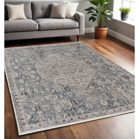 Blue and Ivory Floral Power Loom Area Rug Photo 1