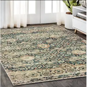 Photo of Blue And Ivory Geometric Distressed Area Rug