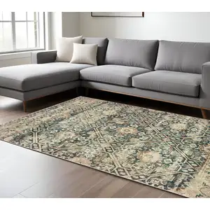 Photo of Blue And Ivory Geometric Distressed Area Rug