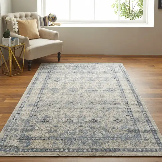 Blue And Ivory Geometric Power Loom Distressed Area Rug Photo 5