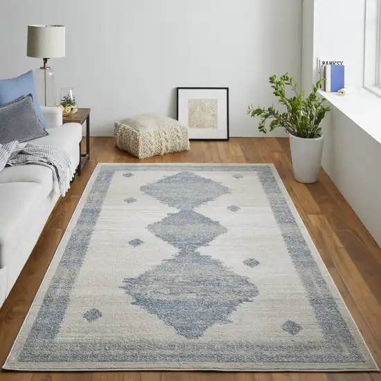 Blue And Ivory Geometric Power Loom Distressed Area Rug Photo 8