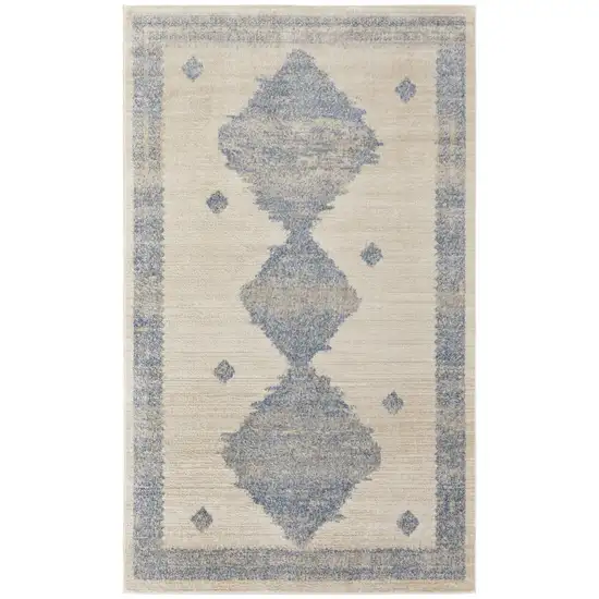 Blue And Ivory Geometric Power Loom Distressed Area Rug Photo 1