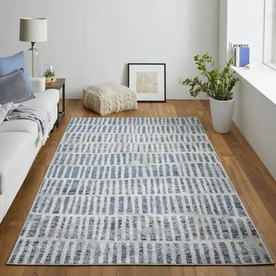 Blue And Ivory Geometric Power Loom Distressed Area Rug Photo 8