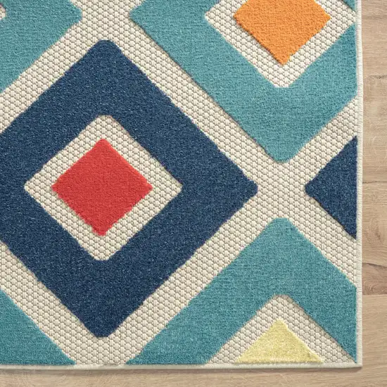 Blue And Ivory Geometric Stain Resistant Indoor Outdoor Area Rug Photo 3