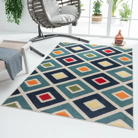 Blue And Ivory Geometric Stain Resistant Indoor Outdoor Area Rug Photo 7