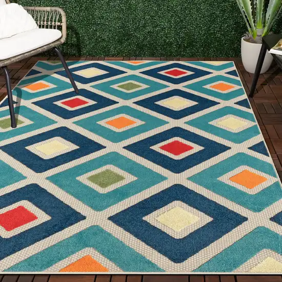 Blue And Ivory Geometric Stain Resistant Indoor Outdoor Area Rug Photo 8