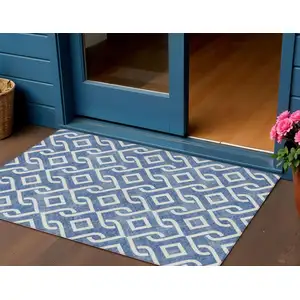 Photo of Blue And Ivory Geometric Washable Indoor Outdoor Area Rug