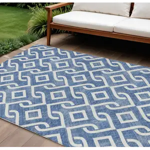 Photo of Blue And Ivory Geometric Washable Indoor Outdoor Area Rug