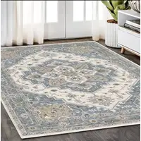 Photo of Blue And Ivory Medallion Distressed Area Rug With Fringe