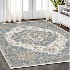 Photo of Blue And Ivory Medallion Distressed Area Rug With Fringe