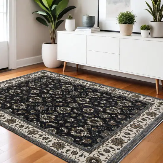 Blue And Ivory Oriental Area Rug With Fringe Photo 1