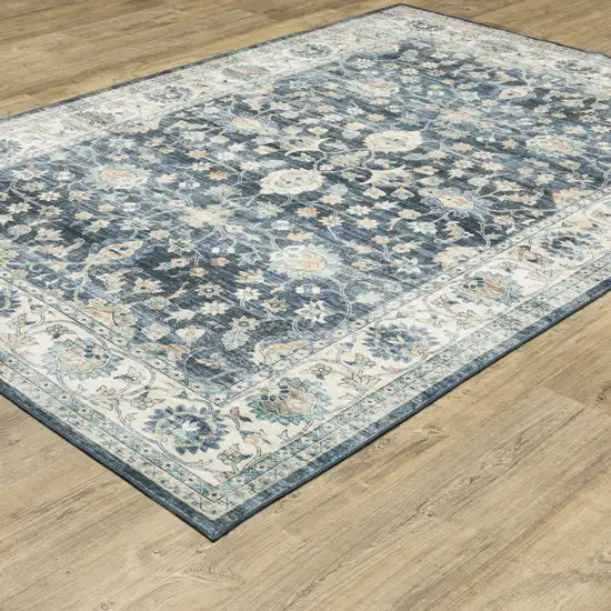 Blue And Ivory Oriental Distressed Area Rug Photo 4