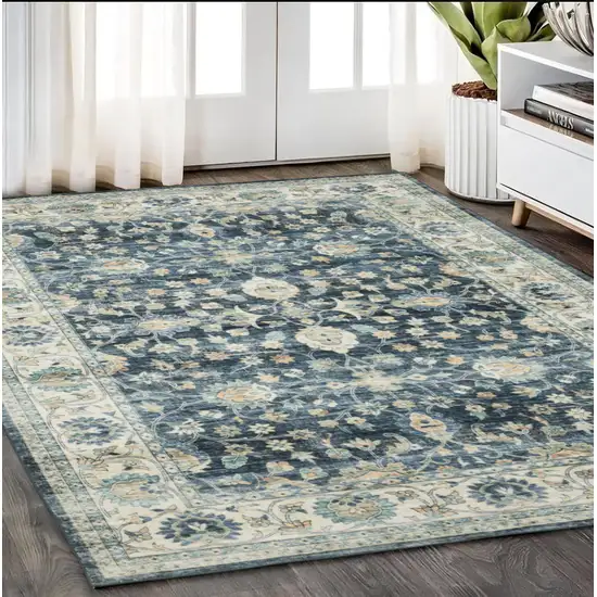 Blue And Ivory Oriental Distressed Area Rug Photo 1