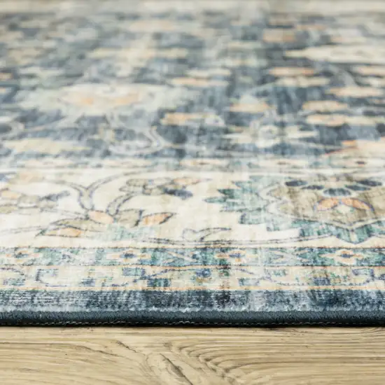 Blue And Ivory Oriental Distressed Area Rug Photo 6