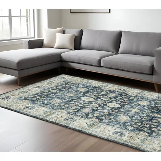 Blue And Ivory Oriental Distressed Area Rug Photo 1