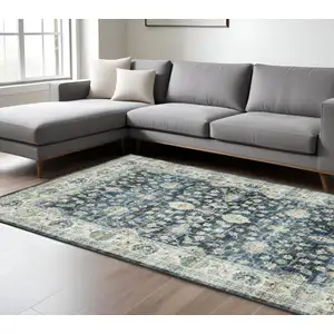 Photo of Blue And Ivory Oriental Distressed Area Rug