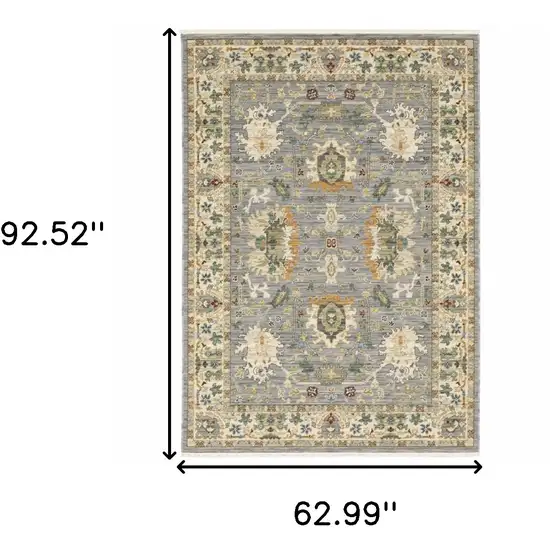 Blue And Ivory Oriental Power Loom Stain Resistant Area Rug With Fringe Photo 10