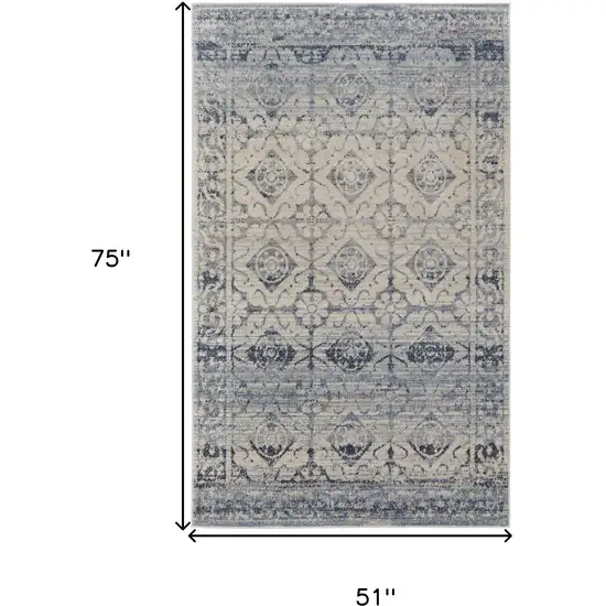 Blue And Ivory Power Loom Distressed Area Rug Photo 4