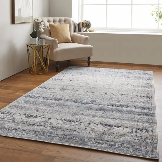 Blue And Ivory Power Loom Distressed Area Rug Photo 6