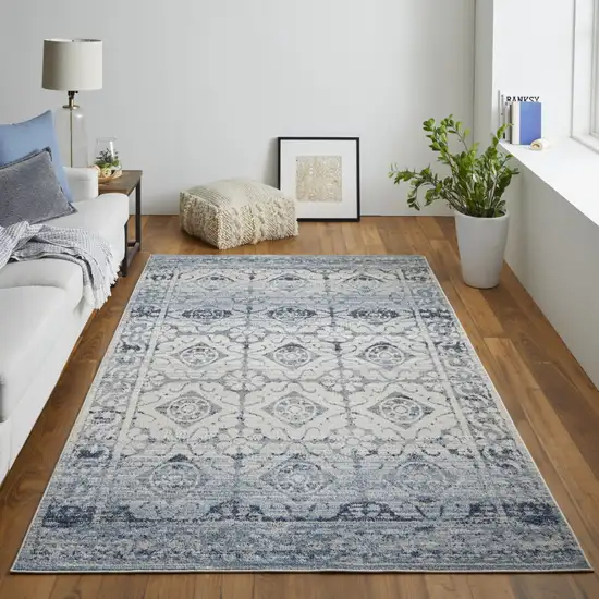 Blue And Ivory Power Loom Distressed Area Rug Photo 7