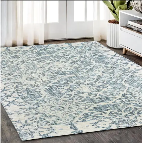 Blue And Ivory Wool Geometric Hand Tufted Area Rug Photo 1