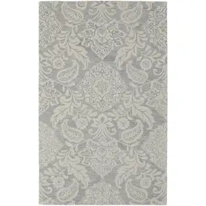 Photo of Blue And Ivory Wool Paisley Tufted Handmade Stain Resistant Area Rug