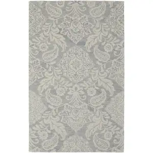 Photo of Blue And Ivory Wool Paisley Tufted Handmade Stain Resistant Area Rug