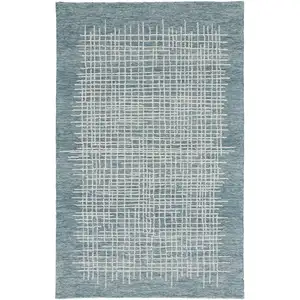 Photo of Blue And Ivory Wool Plaid Tufted Handmade Stain Resistant Area Rug