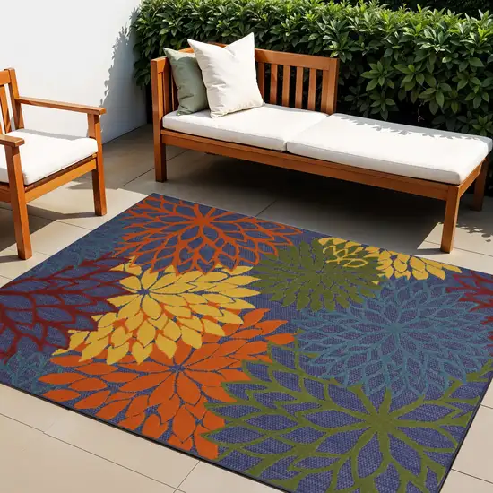 Blue And Orange Floral Power Loom Area Rug Photo 1