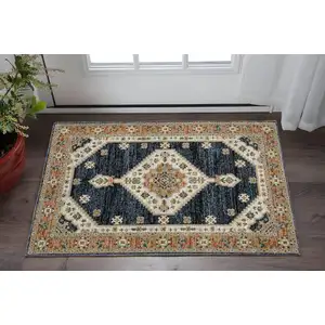 Photo of Blue And Orange Medallion Area Rug