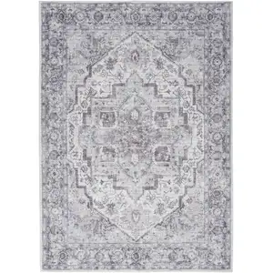 Photo of Blue And Pink Floral Power Loom Distressed Washable Area Rug