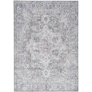 Photo of Blue And Pink Floral Power Loom Distressed Washable Area Rug