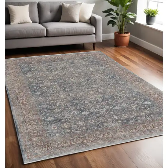 Blue and Beige Floral Power Loom Area Rug Photo 1