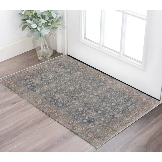 Blue and Beige Floral Power Loom Area Rug Photo 1