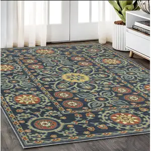 Photo of Blue And Rust Medallion Area Rug With Fringe