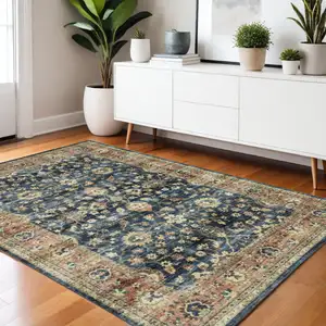 Photo of Blue And Rust Oriental Distressed Area Rug