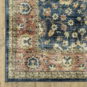 Photo of Blue And Rust Oriental Distressed Area Rug