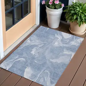 Photo of Blue And Sky Blue Abstract Washable Indoor Outdoor Area Rug