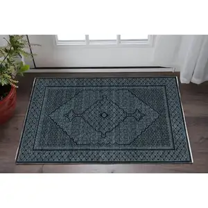 Photo of Blue And Teal Medallion Area Rug With Fringe