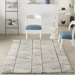 Photo of Blue And White Wool Abstract Area Rug