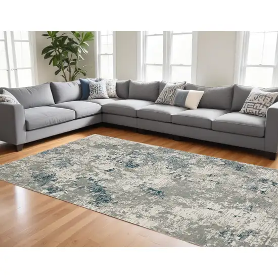 Blue and Beige Abstract Power Loom Area Rug Photo 1