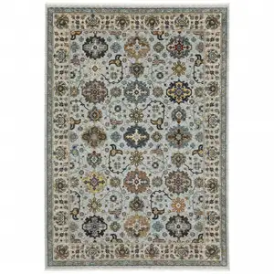 Photo of Blue Beige Grey Green Yellow And Rust Oriental Power Loom Stain Resistant Area Rug With Fringe