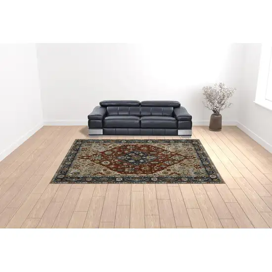 Blue Beige Tan Brown Gold And Rust Red Oriental Power Loom Stain Resistant Area Rug With Fringe Photo 3