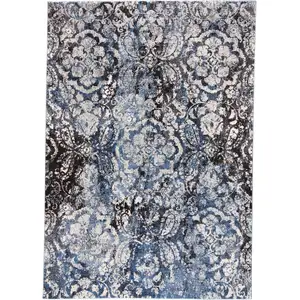 Photo of Blue Black and Ivory Abstract Power Loom Distressed Area Rug