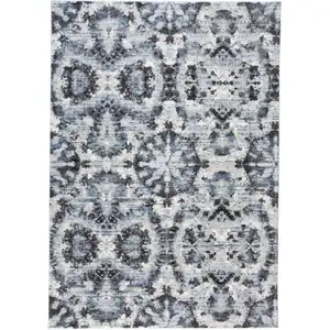 Photo of Blue Black and Ivory Ikat Power Loom Area Rug